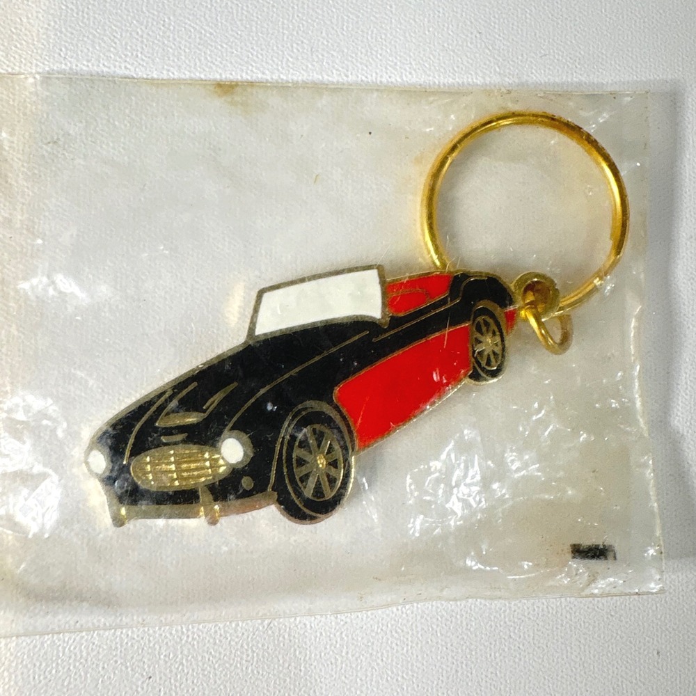 Vintage 60th St Pete Womens Classic Sports Car Enamel Keychain Black Red Gold